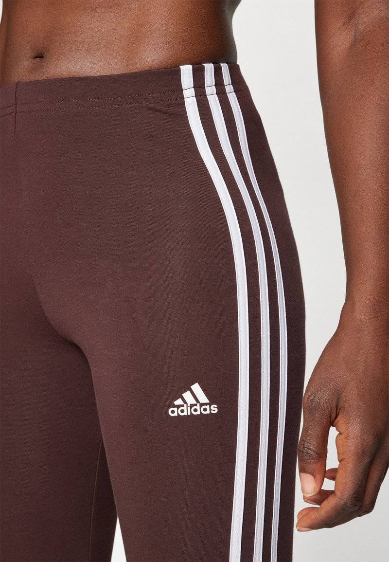 adidas Sportswear adidas Sportswear ESSENTIALS 3 STRIPES HIGH WAISTED - Leggings - shadow brown Schlussverkauf