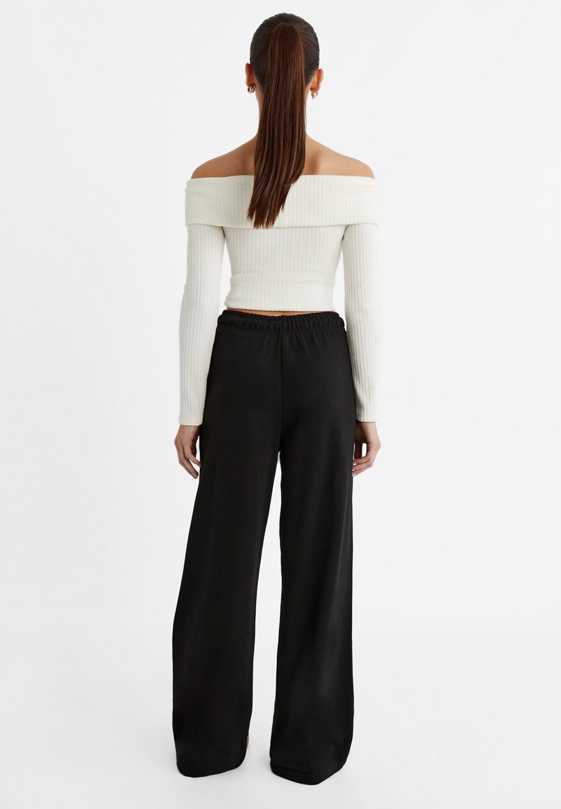 Stradivarius Stradivarius WIDE-LEG JOGGER - Tracksuit bottoms - black Angebote