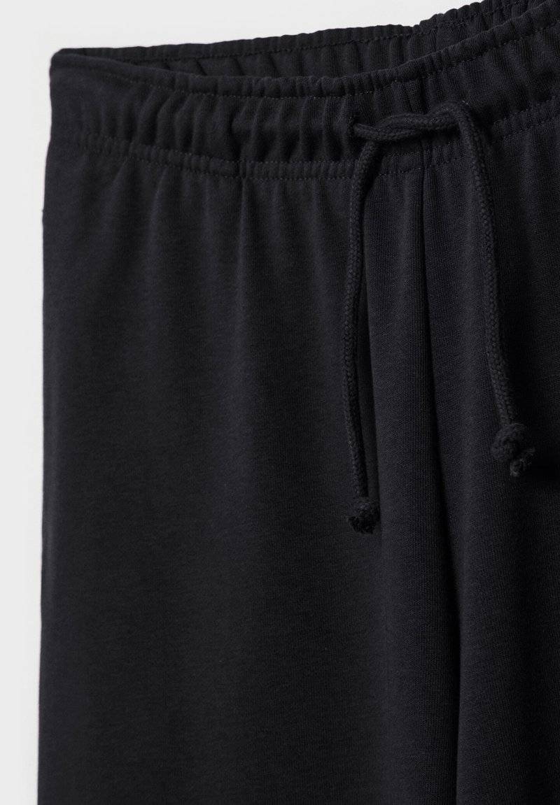 Stradivarius Stradivarius WIDE-LEG JOGGER - Tracksuit bottoms - black Angebote