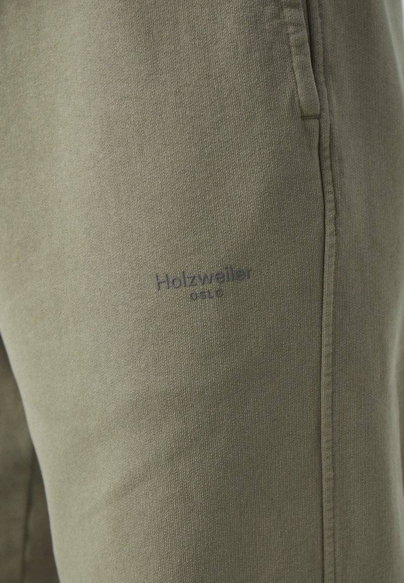 Holzweiler Holzweiler LAGOON OSLO TROUSERS UNISEX - Tracksuit bottoms - green Schlussverkauf