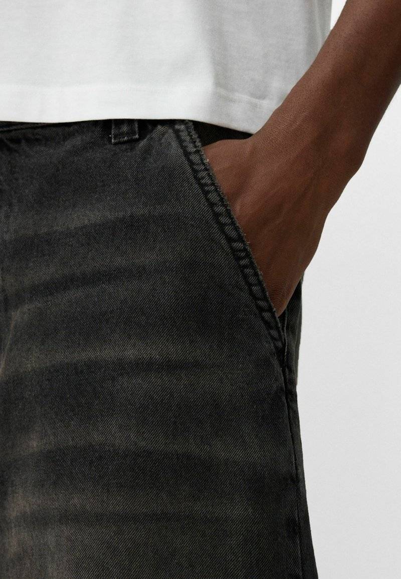Bershka Bershka Relaxed fit jeans - black denim Angebote