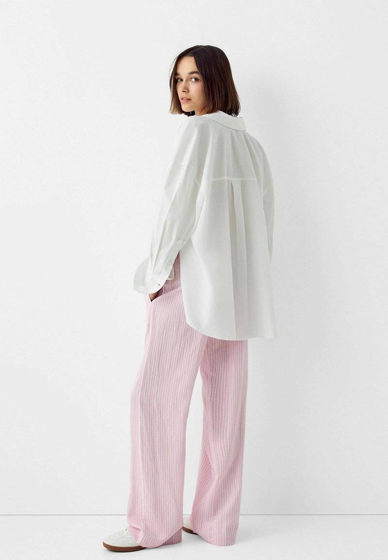 Bershka Bershka WITH AN ELASTIC - Trousers - light pink Schlussverkauf