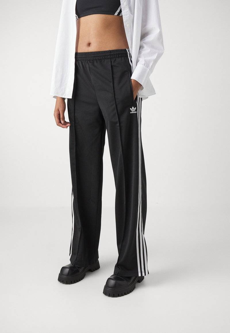 adidas Originals adidas Originals FBIRD LOOSE - Tracksuit bottoms - black Auslauf