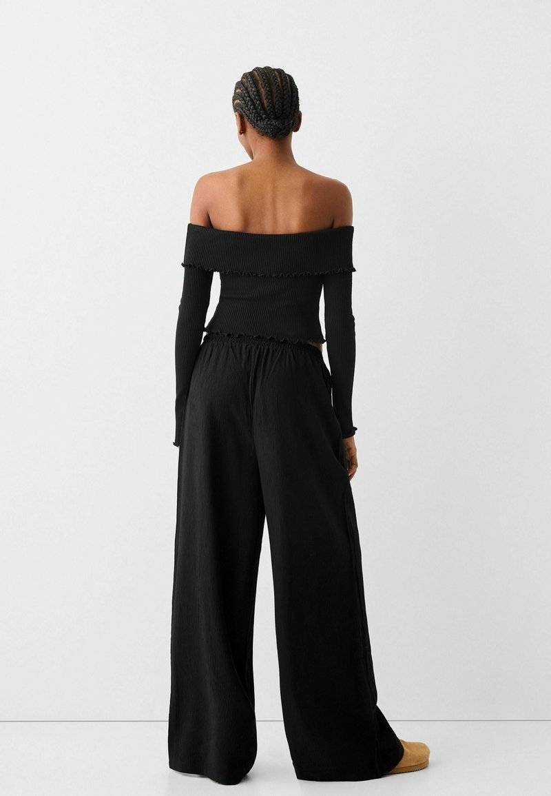Bershka Bershka Trousers - black Angebote