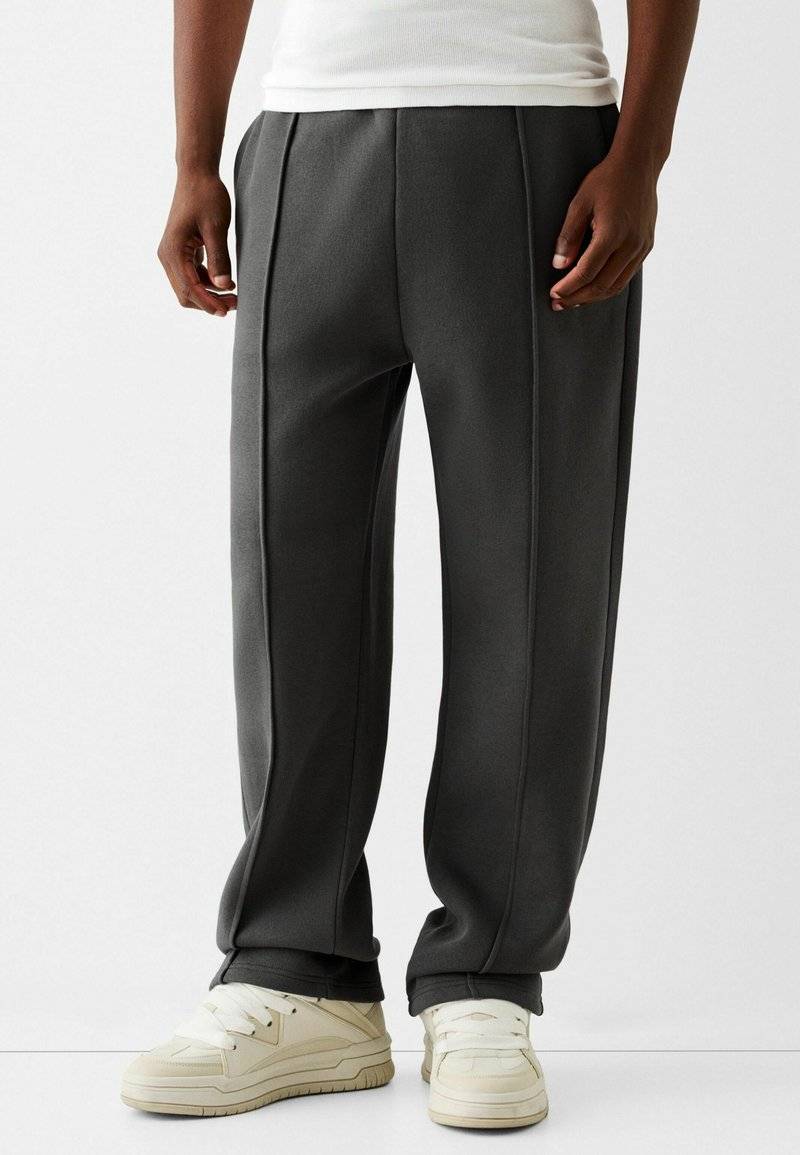 Bershka Bershka WIDE - Tracksuit bottoms - dark grey