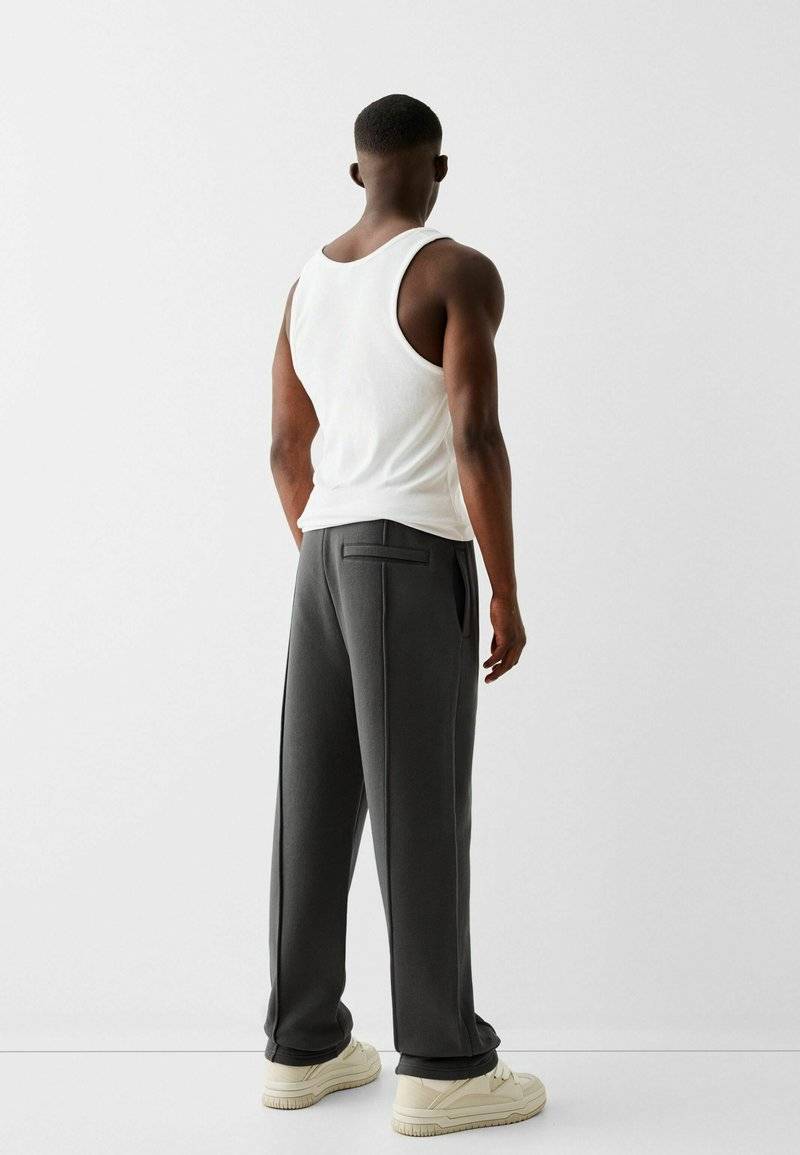 Bershka Bershka WIDE - Tracksuit bottoms - dark grey Meist gekauft