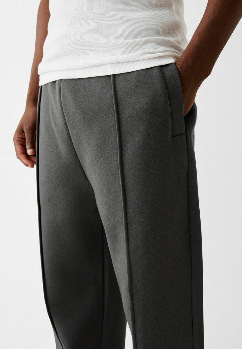 Bershka Bershka WIDE - Tracksuit bottoms - dark grey Meist gekauft