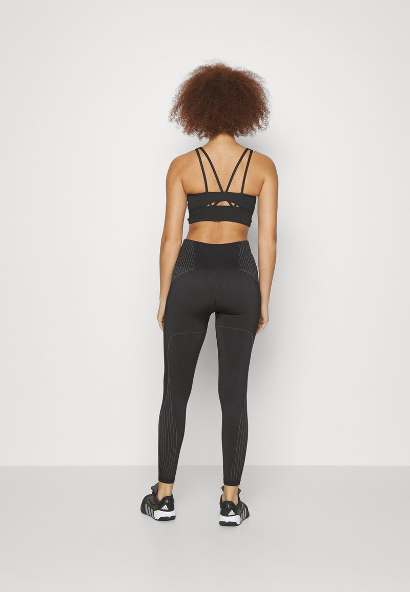 adidas Performance adidas Performance SEAMLESS BRANDED 7/8 - Leggings - black Osterangebot