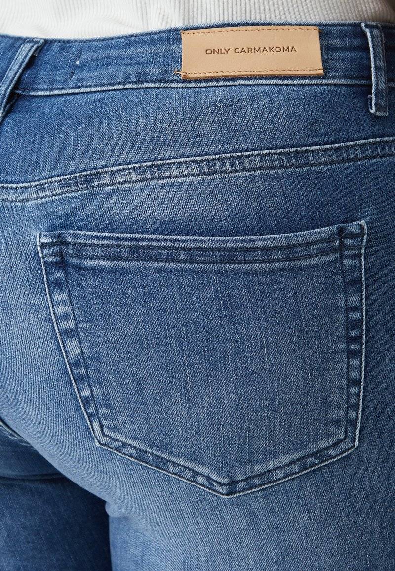 ONLY Carmakoma ONLY Carmakoma CARWILLY - Jeans Skinny Fit - medium blue denim Valentinstagsangebot