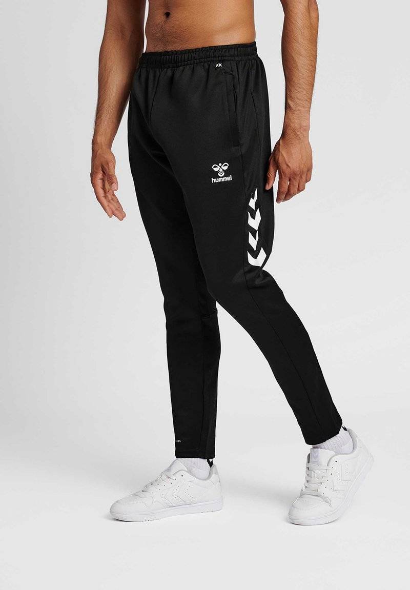 Hummel Hummel CORE XR TRAINING PANTS - Tracksuit bottoms - black