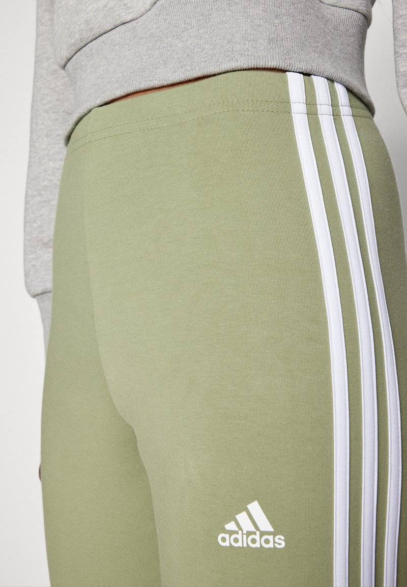 adidas Sportswear adidas Sportswear ESSENTIALS 3 STRIPES HIGH WAISTED - Leggings - tent green Black Friday Preise