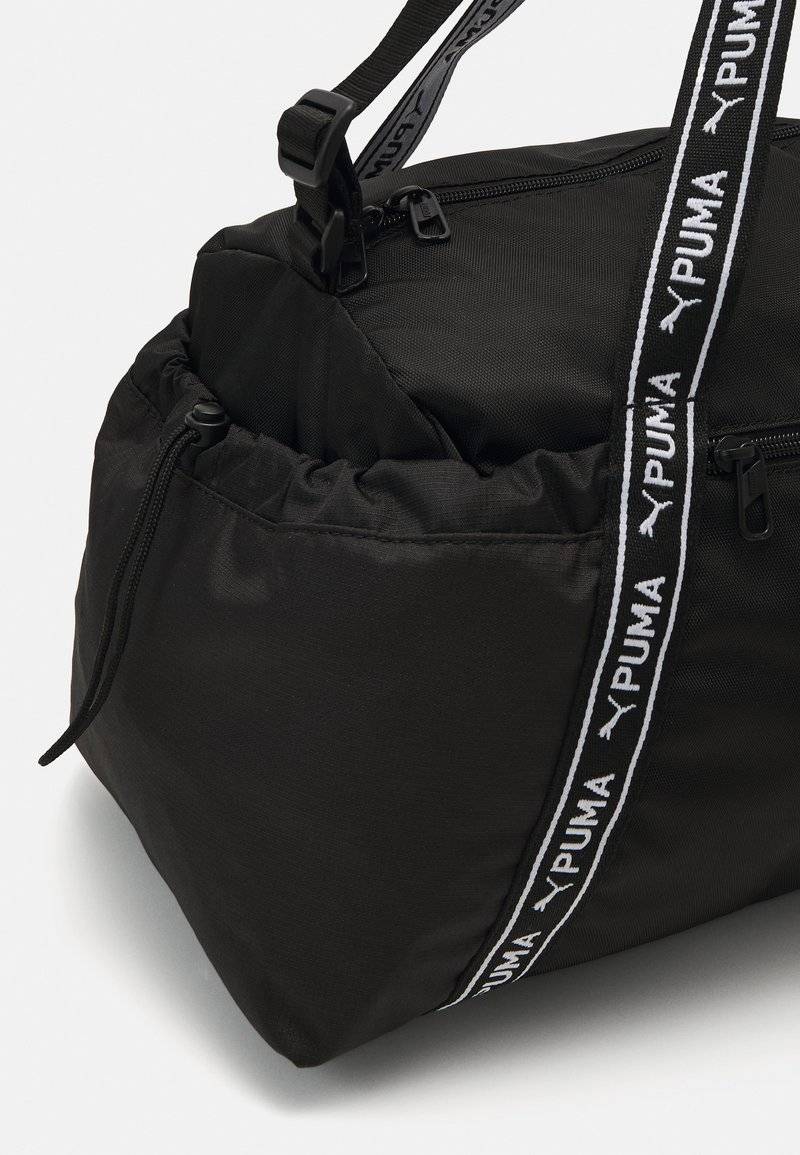 Puma Puma SPORT BAG - Sports bag - black Rabatte dieses Monats