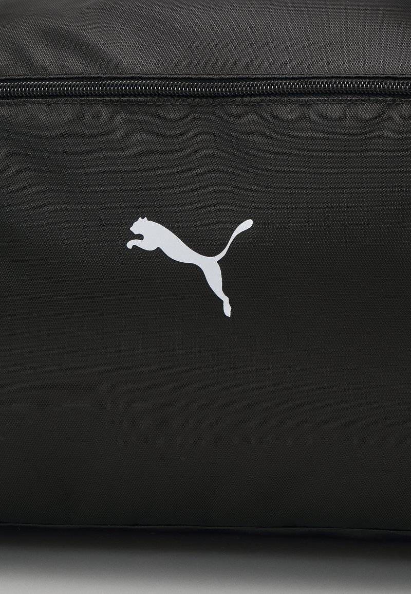 Puma Puma SPORT BAG - Sports bag - black Rabatte dieses Monats