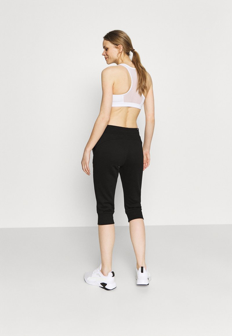 Puma Puma CAPRI - 3/4 sports trousers - black Neueste Stile