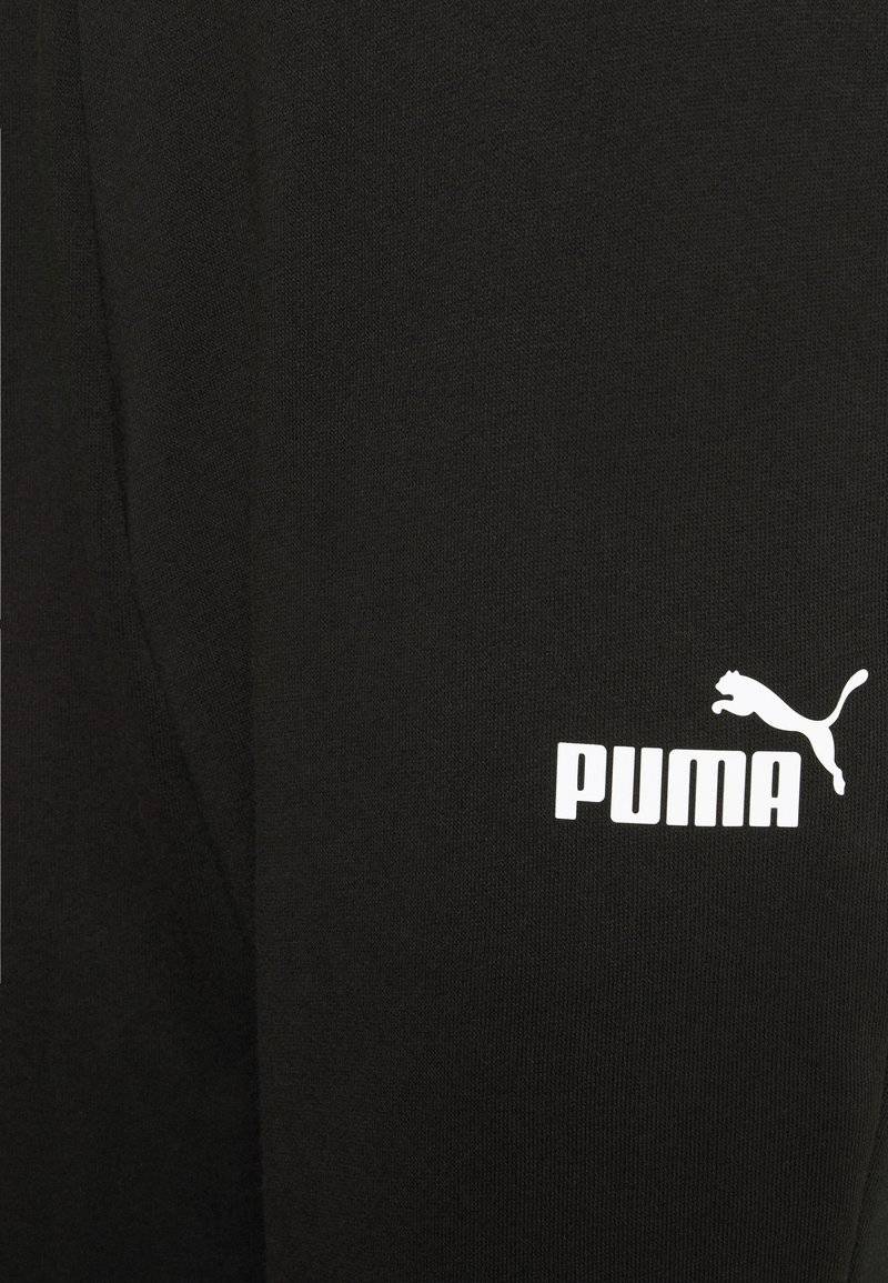 Puma Puma CAPRI - 3/4 sports trousers - black Neueste Stile