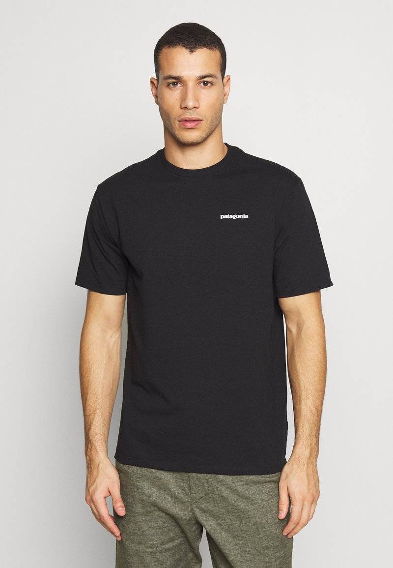 Patagonia Patagonia LOGO TEE - Print T-shirt - black Bis zu 55% Rabatt