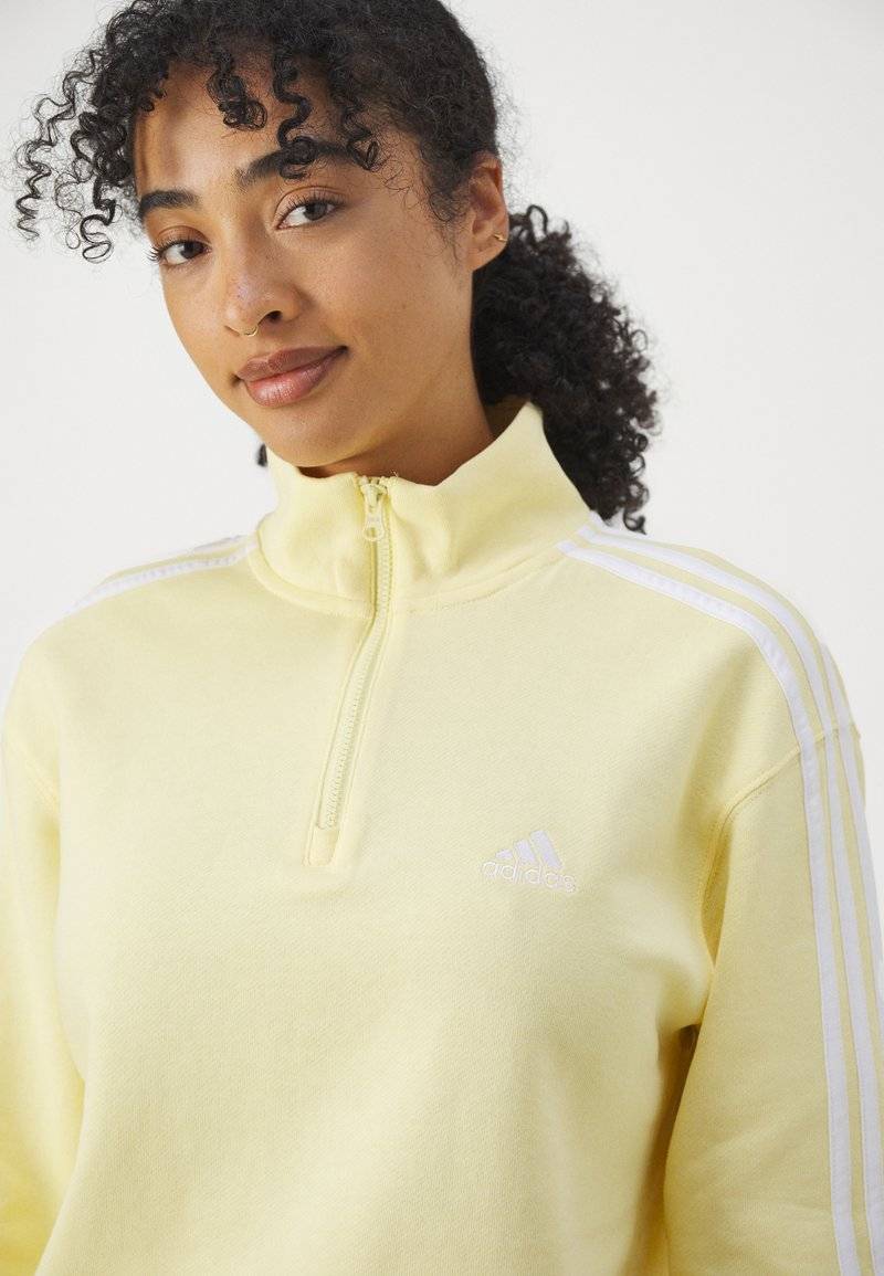adidas Sportswear adidas Sportswear ESSENTIALS 3-STRIPES QUARTER ZIP - Sweatshirt - almost yellow Black Friday Preise