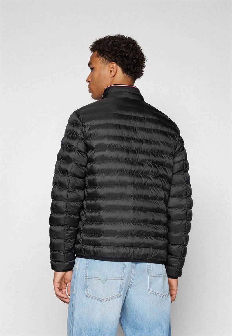 Tommy Hilfiger Tommy Hilfiger PACKABLE - Light jacket - black Kostenloser Versand international