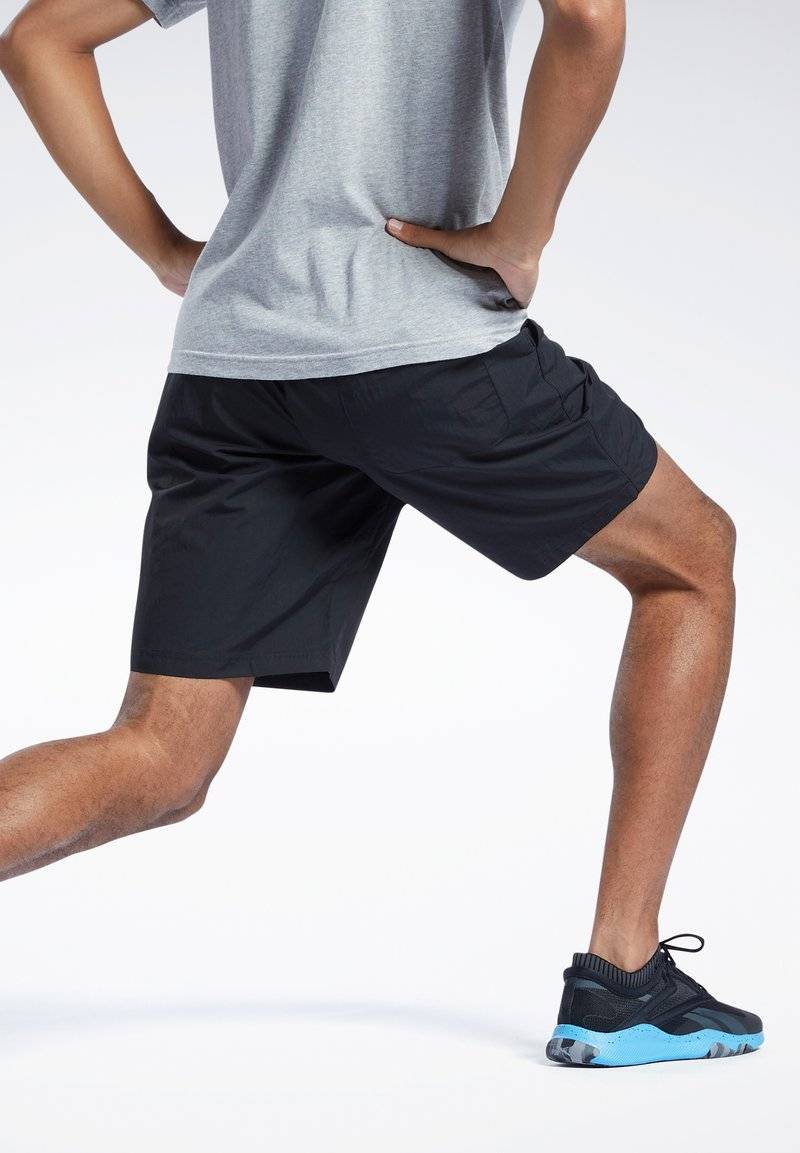 Reebok Reebok ID TRAIN UTILITY - Sports shorts - black Verkauf