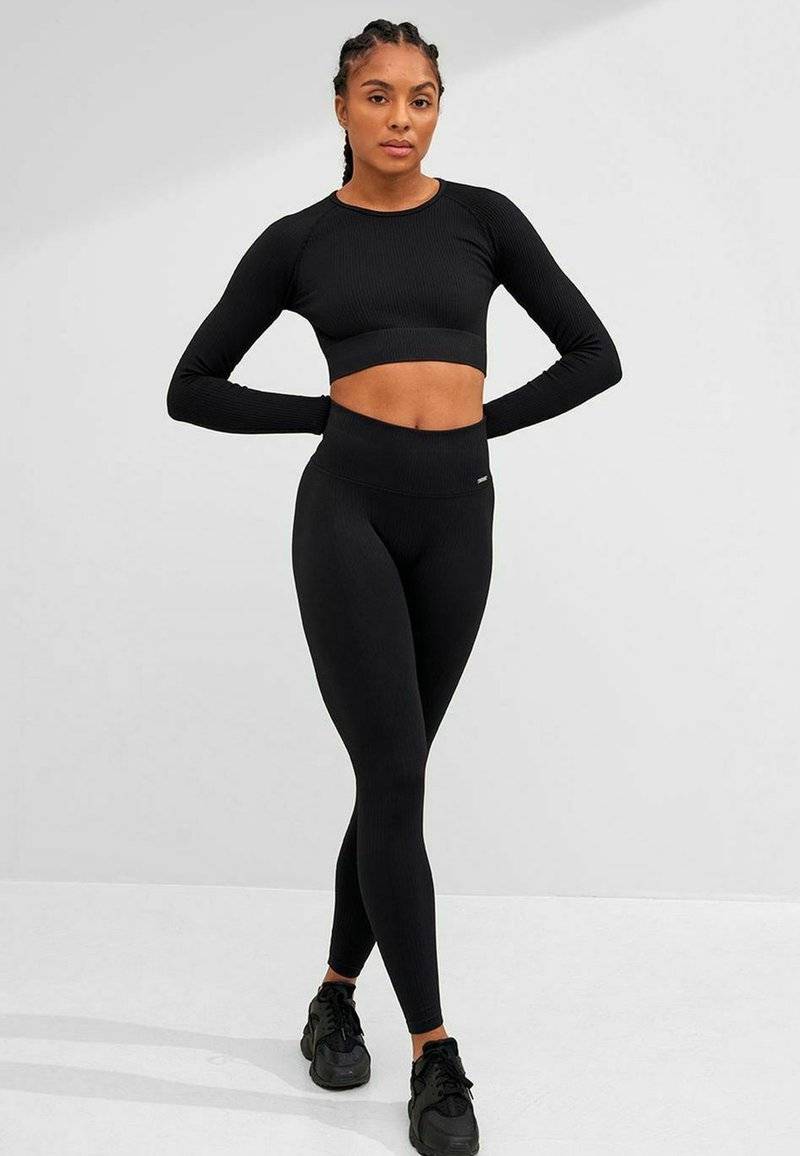 aim’n® aim’n® RIBBED SEAMLESS - Leggings - black Preisnachlass
