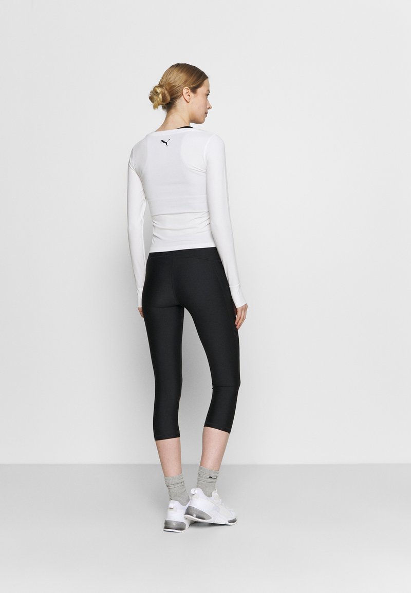 Under Armour Under Armour HI CAPRI - 3/4 sports trousers - black Bis zu 60% Rabatt