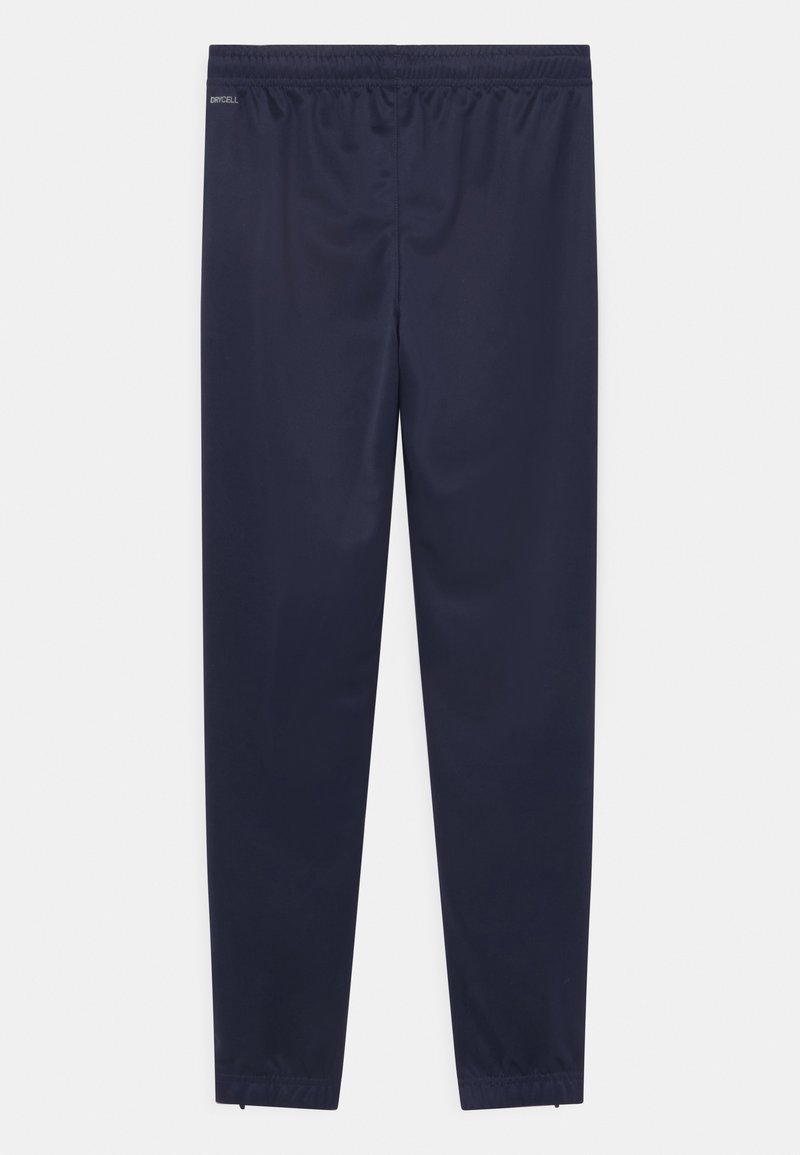 Puma Puma TEAMRISE POLY TRAINING UNISEX - Tracksuit bottoms Bis zu 55% Rabatt