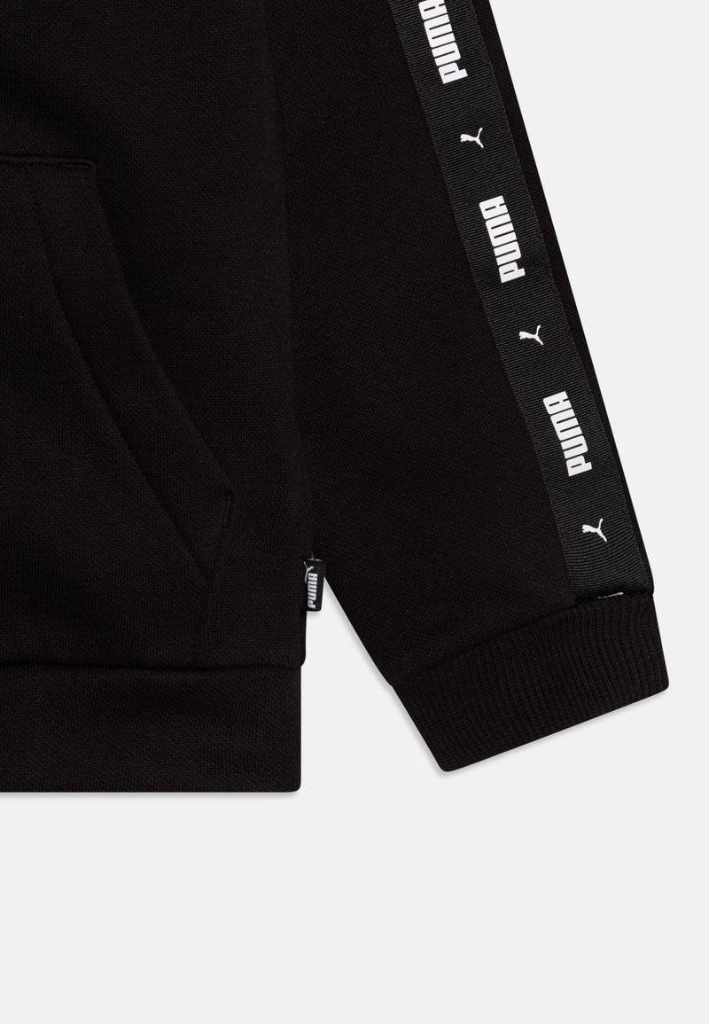 Puma Puma TAPE SWEAT SUIT UNISEX SET - Tracksuit - black Rabatte dieses Monats