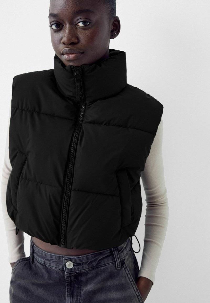 Bershka Bershka CROPPED PUFFER - Waistcoat - black denim Auslauf