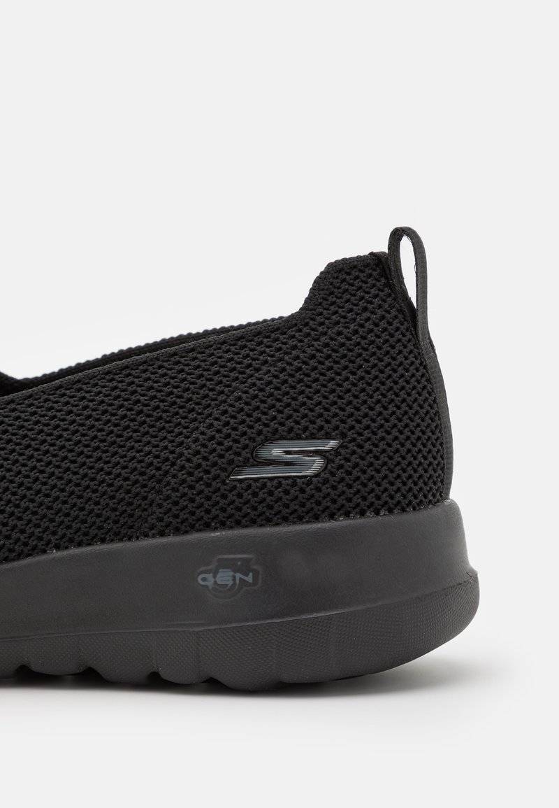 Skechers Performance Skechers Performance GO WALK SLIP ON - Walking trainers - black Preisnachlass