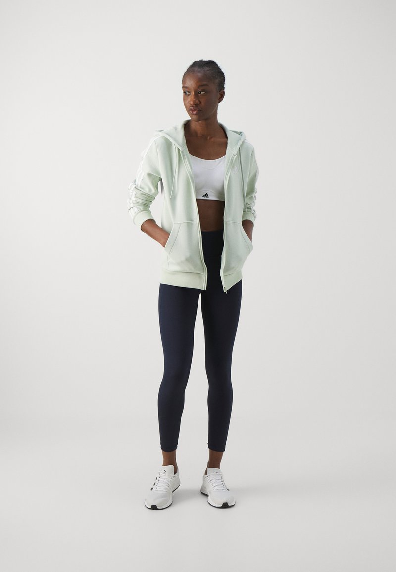adidas Sportswear adidas Sportswear ESSENTIALS 3 STRIPES FULL ZIP HOODIE - Zip-up sweatshirt - linen green Weihnachtsangebot