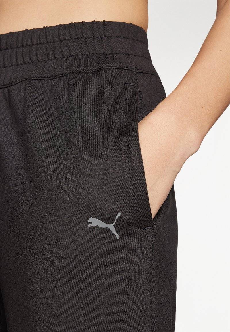 Puma Puma STUDIO FOUNDATIONS - Tracksuit bottoms - black Super Rabatt