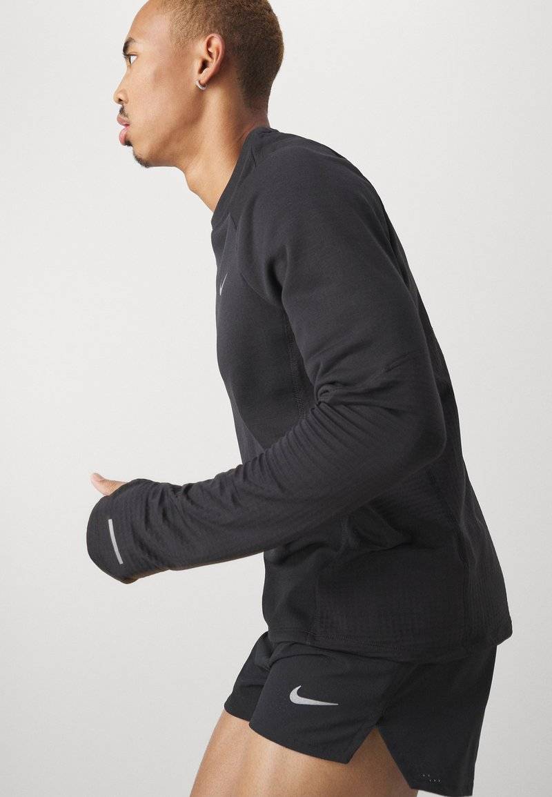 Nike Performance Nike Performance FAST SHORT - Sports shorts Neueste Mode