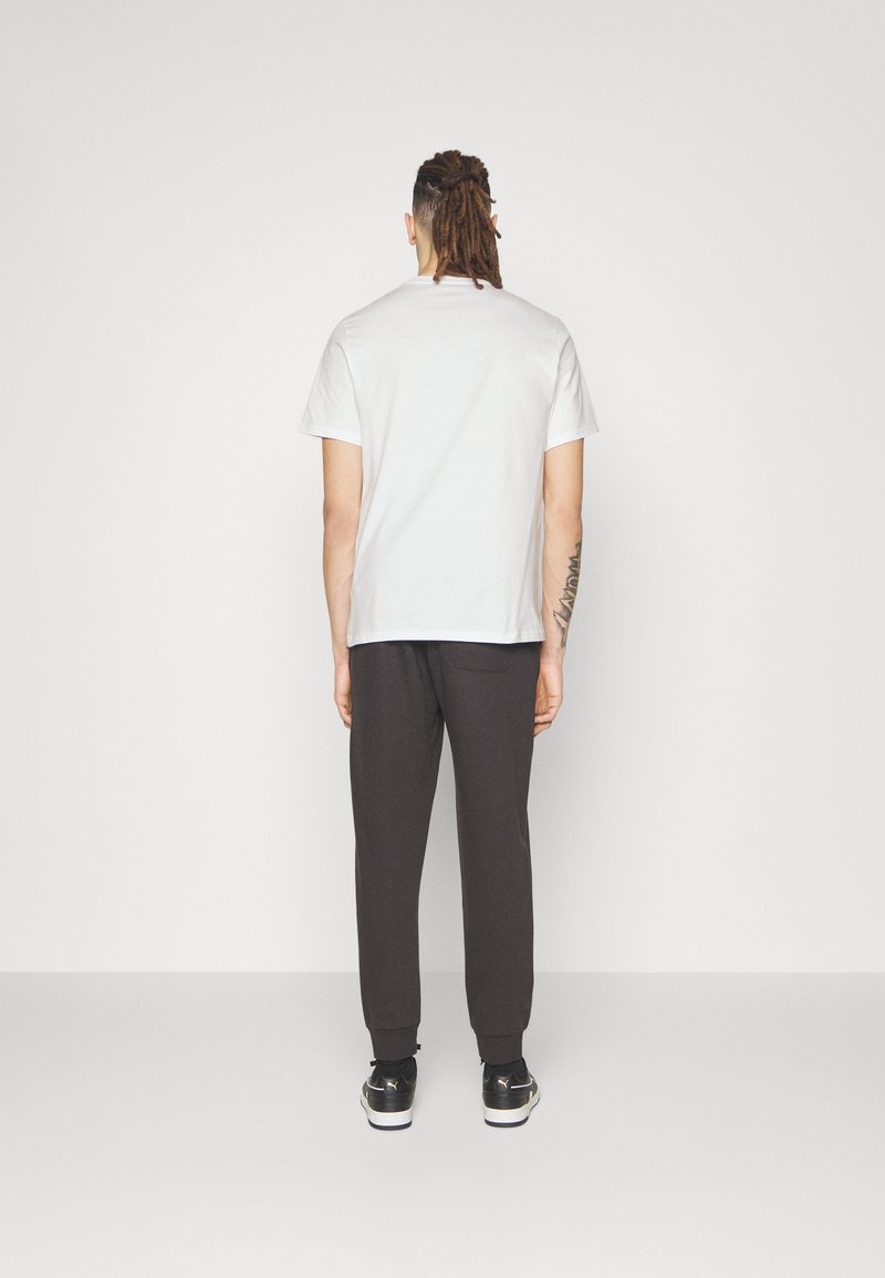 Converse Converse GO TO STAR CHEVRON TEE UNISEX - Print T-shirt - white Riesige Ersparnisse