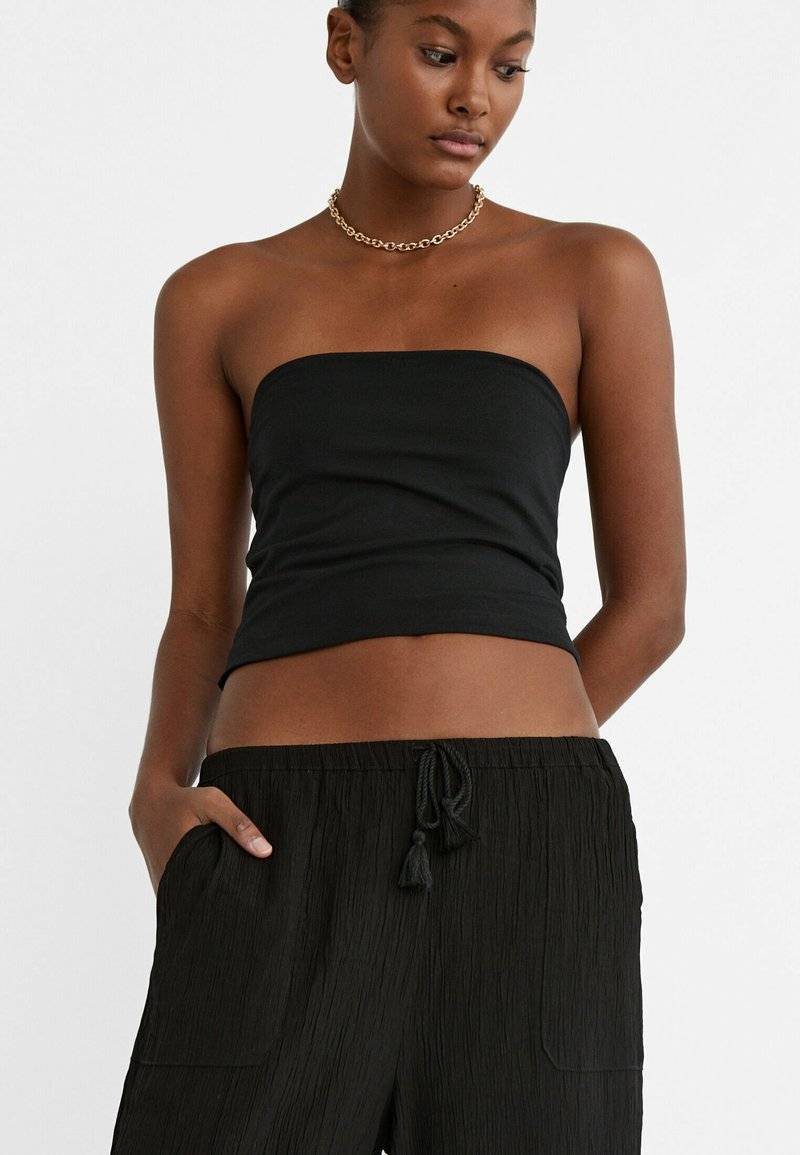 Stradivarius Stradivarius FLOWING CULOTTES - Trousers - black Vierteljährliche Förderung
