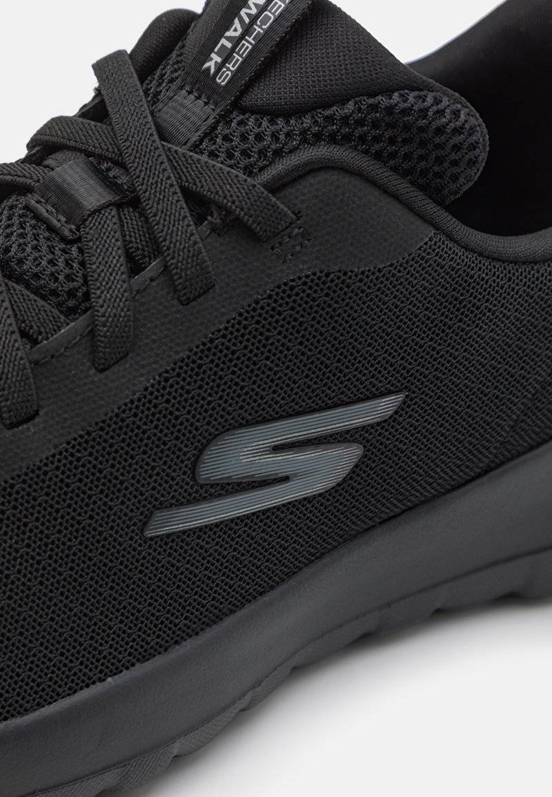 Skechers Performance Skechers Performance GO WALK BUNGEE - Walking trainers - black Im Verkauf